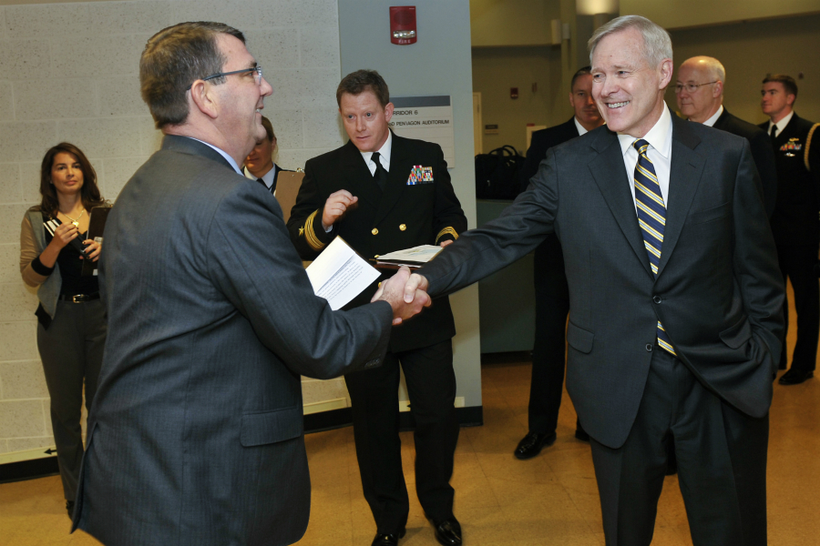 Deputy Secretary of Defense Ashton B. Carter, left, is greeted by Ray Mabus, Secretary of the Navy, as he arrives for the Navy Birthday celebration in the Pentagon Auditorium, October 9, 2012. (DoD Photo By Glenn Fawcett) (Released)