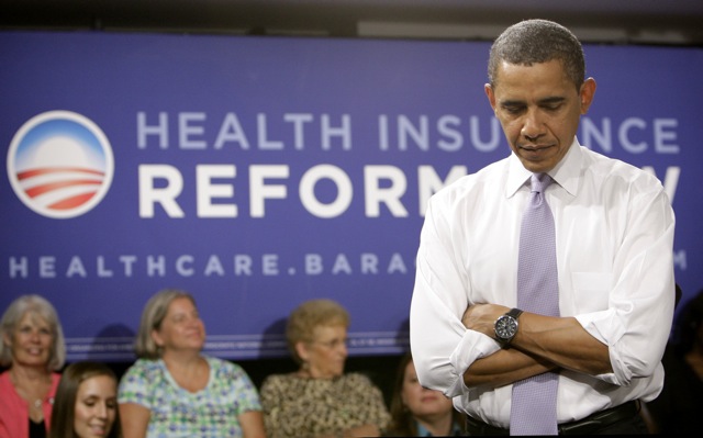 President Barack Obama listens to a question during the Organizing for America National Health Care Forum at the Democratic National Committee headquarters in Washington Thursday, Aug. 20, 2009.(AP Photo/Alex Brandon)