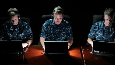 110524-N-GS507-210 PENSACOLA, Fla. (May 24, 2011) Students from the Center for Information Dominance (CID) Corry Station, Cryptologic Technician Collection Seaman Recruit Ben Lowden, of Brownsberg, Ind., Cryptologic Technician Networks Seaman Apprentice Alicia Sutliff, of Jacksonville, Fla., and Cryptologic Technician Technical Third Class Steven Tometczak, of Reno, Nev., preview the Integrated System for Language Education and Training program (ISLET), which is being tested by the CID-based Center for Language, Regional Expertise and Culture (CLREC) and the Academic Consortium for Global Education (ACGE). Conceived as an alternative to traditional computer-based training and classroom instruction, ISLET employs online social networking, interactive role-play, competitive gaming and speech recognition to create an immersive environment for collaborative learning. (U.S. Navy photo by Gary Nichols/Released)