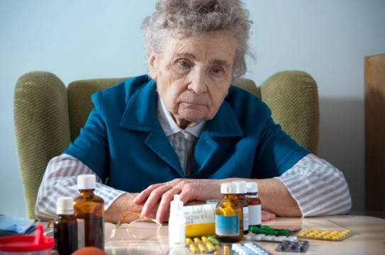 Senior-Elderly-Woman-Drugs-Prescription-Pills-Sad