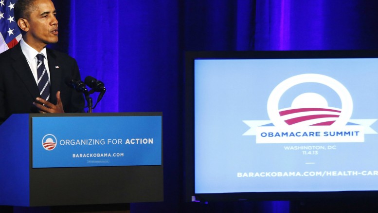 U.S. President Barack Obama delivers remarks on the Affordable Care Act, commonly known as Obamacare, at an Organizing for Action grassroots supporter event in Washington, in this November 4, 2013, file photo.  New Year's Day will bring a fresh test for President Barack Obama's healthcare overhaul, as hundreds of thousands of Americans will begin to use the program's new medical coverage for the first time. REUTERS/Jonathan Ernst/Files  (UNITED STATES - Tags: POLITICS HEALTH)